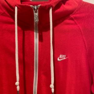 this red nike zip up hoodie